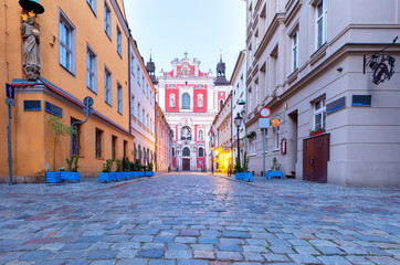 Poznan. Old traditional narrow city street at sunrise.