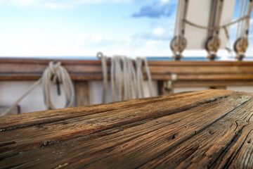 Wooden desk of free space and summer time on ship 