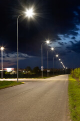 Canvas Print - road in the industrial zone with modern LED lighting