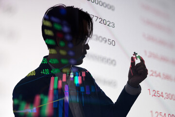 Poster - Double Exposure Silhouette of businessman  hold jigsaw with stock market pricelist graph. Concept for business and financial economy.