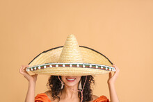 Beautiful Woman In Sombrero Hat On Color Background