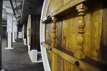 Yalta, Crimea - 10.16.2015 : Barrels of wine are laid out in the cellar of the old winery.