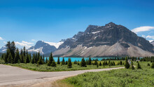 Beautiful Turquoise Waters Of The Bow Lake With Snow-covered Peaks In Rocky Mountains, Banff National Park, Canada.	 Panoramic View.