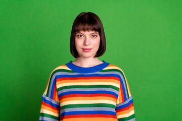 Wall Mural - Photo of lovely attractive nice woman wear colorful sweater smile good mood isolated on green color background