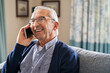 © Rido - Happy carefree old man talking over phone