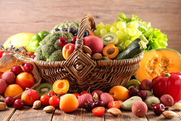 Wall Mural - fruits and vegetables on wood background