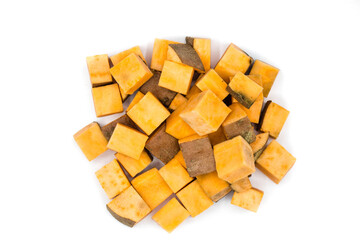 Wall Mural - Sweet potato cubes isolated on white background top view