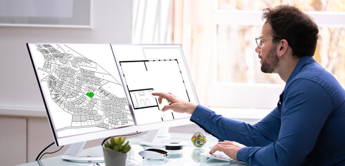 Poster - Developer Looking At Land Plot Map