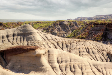 Dinosaur Provincial Park in Alberta, Canada, a UNESCO World Heritage Site noted for its striking badland topography and abundance of dinosaur fossils, one of the richest fossil locales in the world.