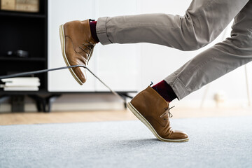 wire cord trip over and fall. feet stumble
