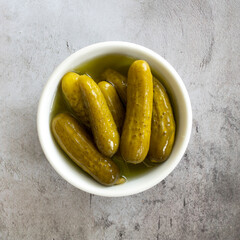 Wall Mural - A Bowl of small Dill Pickles