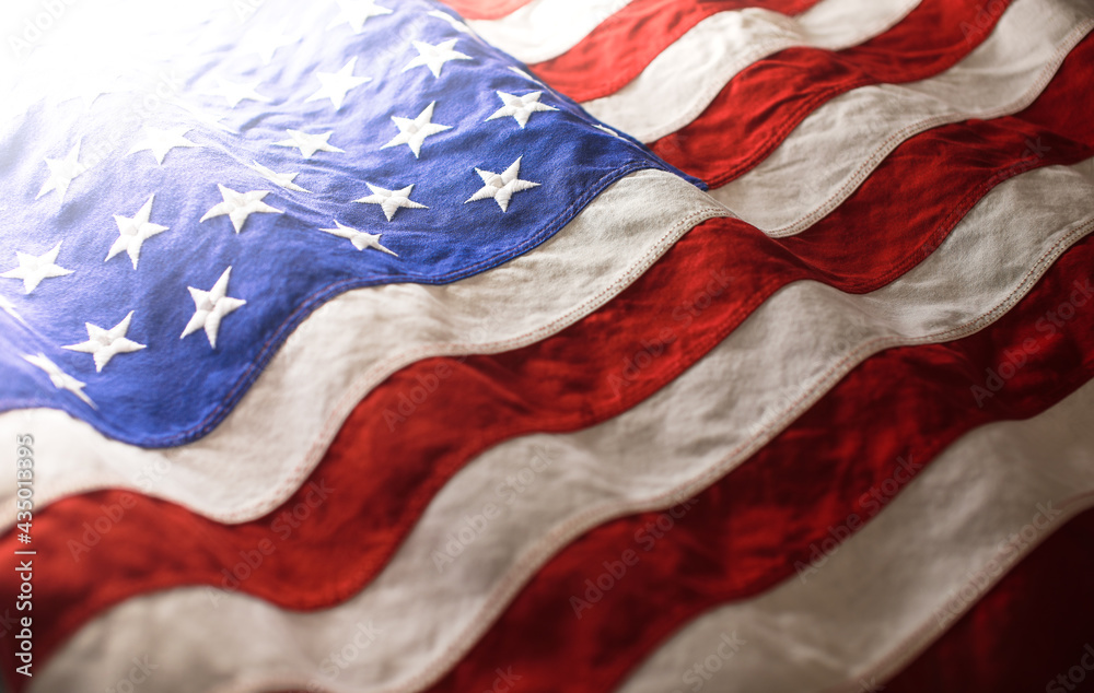 USA background of waving American flag. For 4th of July, Memorial Day, Veteran's Day, or other patriotic celebration. - obrazy, fototapety, plakaty 