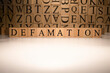 The word defamation end was created from wooden cubes. Countries and politics
