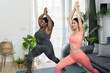 Young Latin women doing yoga and pilates at home - Sport wellness lifestyle concept