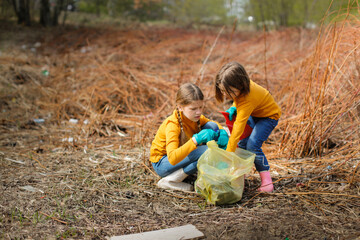 two children are cleaning in the park, children with garbage bags pick up garbage in the forest. car