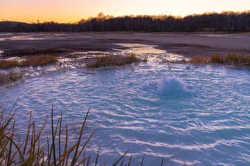 Old Crater in Manziana - carbon dioxide coming out of the earth through water and forming small geyser