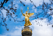 Berlin Victory Column At Sunny Cloudy Day