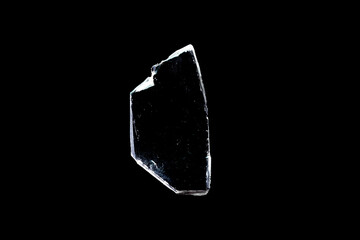 Wall Mural - glass fragments in isolation on a black background. damaged window. damaged object