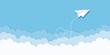 © Bohdan - Blue sky with paper plane flying and clouds vector background. Creative carton border of clouds. Airy atmosphere stylish design. Vector illustration.