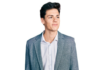 Young hispanic man wearing business clothes smiling looking to the side and staring away thinking.