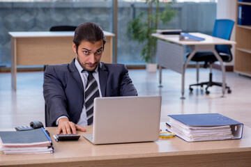 Young businessman employee working in the office