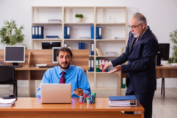 Sticker - Two male employees in gambling concept