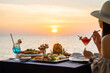 have romantic dinner at sunset time