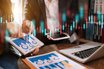 Two stock traiders making analysis of digital market and investment in block chain crypto currency.