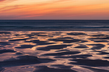 Wall Mural - absolutely stunning landscape images of holywell bay beach in cornwall uk during golden hojur sunset