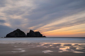 Wall Mural - absolutely stunning landscape images of holywell bay beach in cornwall uk during golden hojur sunset