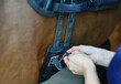 Fasten saddle-girth. Equestrian equipment. Horse riding sport background. 