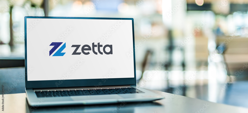 Laptop computer displaying logo of Zetta Stock Photo | Adobe Stock