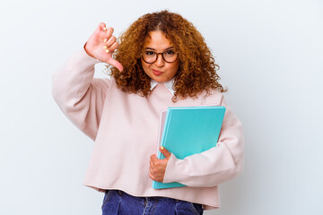 Wall Mural - Young student woman over isolated background showing a dislike gesture, thumbs down. Disagreement concept.