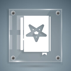 White Ancient magic book with alchemy recipes and mystic spells and enchantments icon isolated on grey background. Square glass panels. Vector