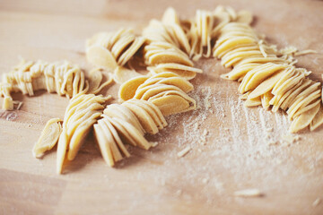 The process of cooking homemade noodles, spaghetti, pasta.