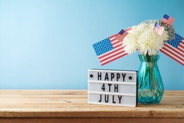 Happy Independence Day, 4th of July celebration concept with home decor and USA flag on wooden table