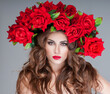 © Svetlana Fedoseeva - beautiful woman with red roses  Professional makeup. fashion model with large hairstyle and flowers in her hair.
