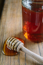 Honey In Jar With Honey Dipper 