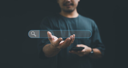 Leinwandbilder - Businessman showing Search Bar On Virtual Screen, Data Search Technology Search Engine Optimization. Man use smart phone to Searching for information. Using Search Console with your website.