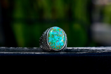 Turquoise is a silver ring decorated with turquoise.