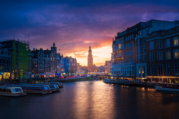 Fototapete - Amsterdam Cityscape with Mint Tower over Amstel River with Colorful Sunset, Holland, Netherlands