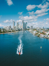 An Aerial View Of Surfers Paradise And The Jetboat Extreme Boat As It Gets Read To Go Fast