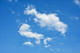 Fototapeta Na sufit - Beautiful cumulus clouds against the blue daytime sky.