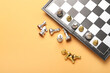 © Pixel-Shot - Game board with chess pieces on color background