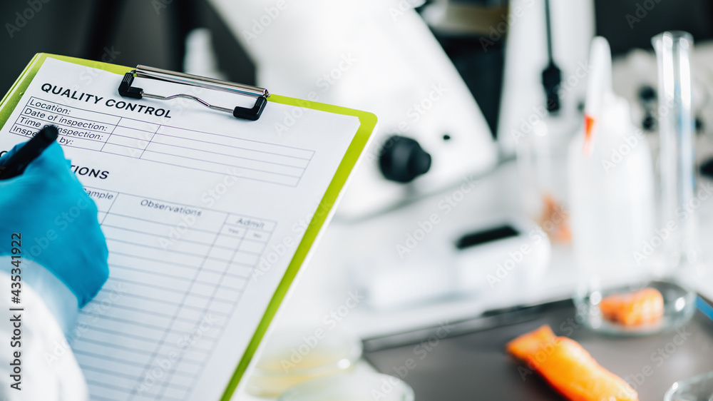 Food Safety and Quality Management. Inspector Filling Out Quality ...