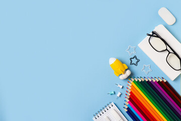 Back to school theme with white schools tools on blue background