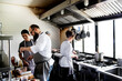 © Rawpixel.com - Group of chefs working in the kitchen