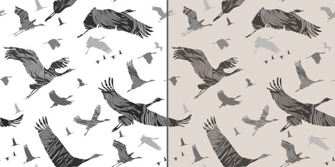 Two seamless patterns with stylized flying cranes. Vector illustration 