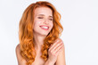 © deagreez - Photo portrait of girl with curly red hair with natural soft skin laughing touching shoulders tender isolated white color background copyspace