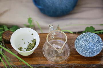 Wall Mural - large leaf Chinese tea in a teapot, infusion